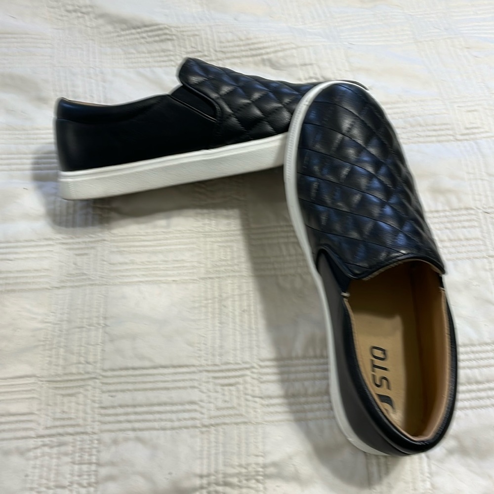 Black quilted top slip on shoes